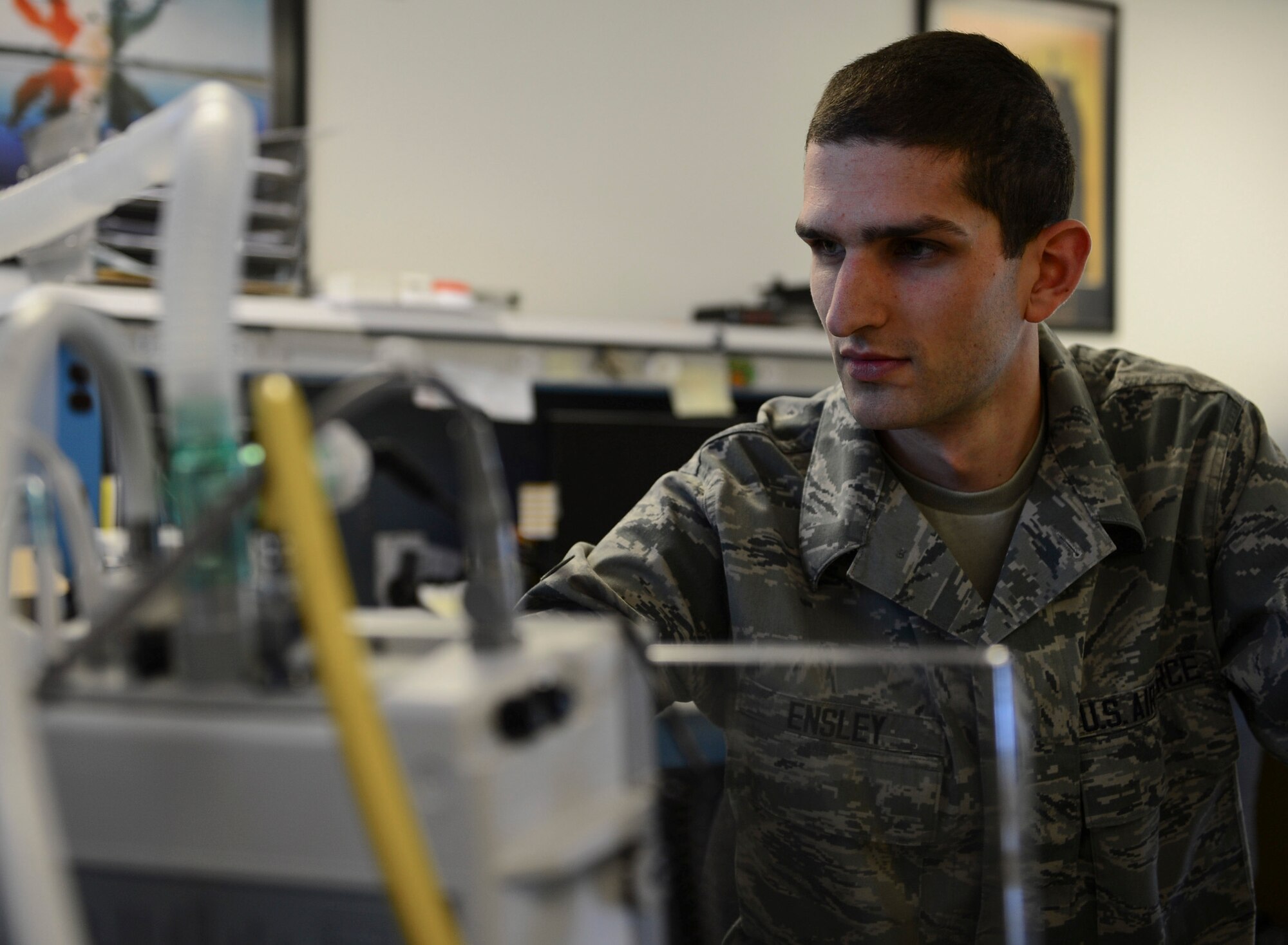 Airman 1st Class Matthew Ensley, 48th Medical Support Squadron biomedical equipment maintenance technician, performs an operational inspection on a ventilator at Royal Air Force Lakenheath, England, June 17, 2014. Airmen of the 48th MDSS conduct maintenance and inspections at RAF Lakenheath as well as at six different clinics throughout the U.K. and Norway. (U.S. Air Force photo by Airman 1st Class Dawn M. Weber/Released)