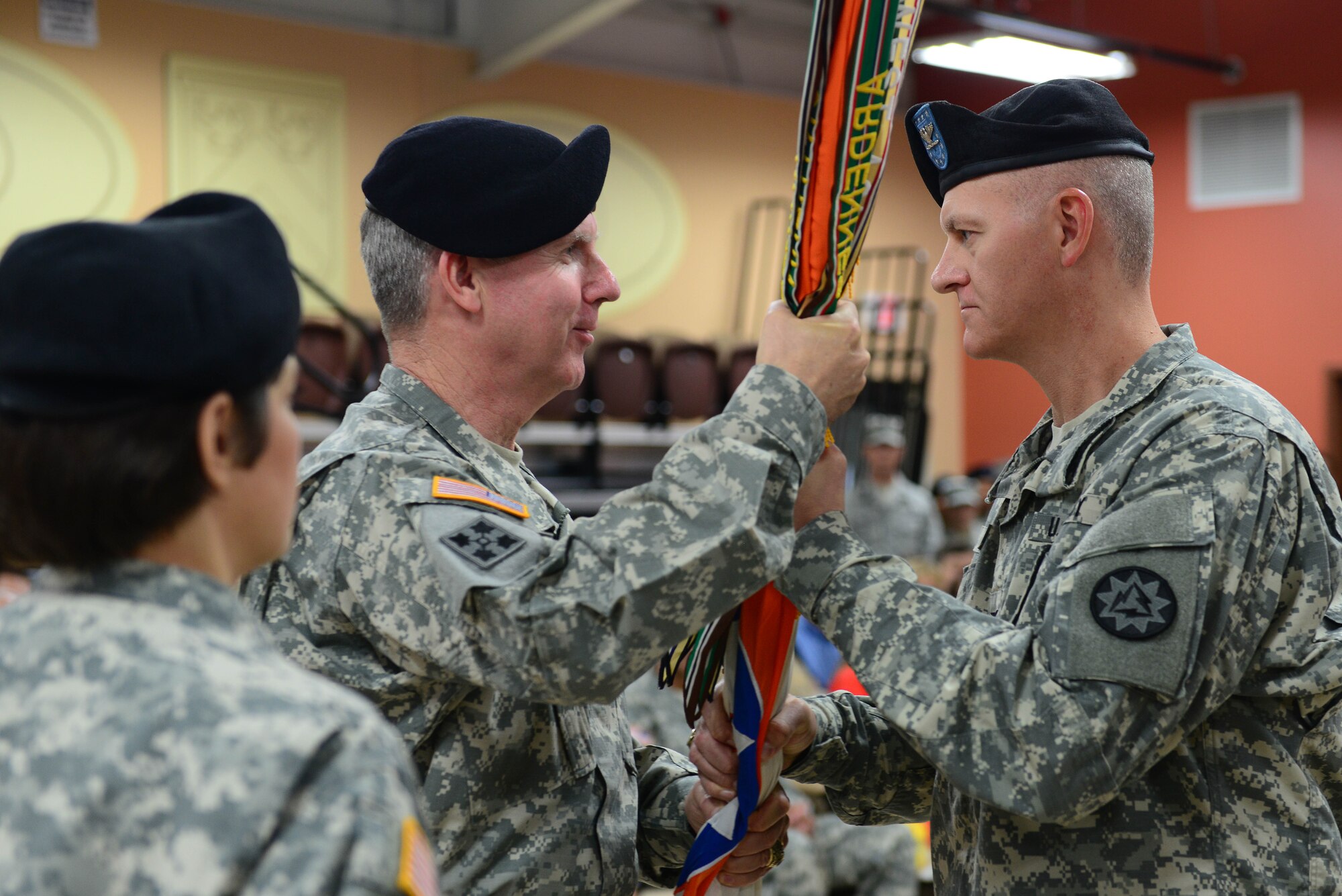 U.S. Army Col. Frank J. Snyder (right), incoming 93rd Signal Brigade commander accepts command from Brig. Gen.  John W. Baker, 7th Signal Command (Theater) commanding general passes during a change of command and responsibility ceremony at Fort Eustis, Va., August 15, 2014. Snyder received command from Col. Maria A. Biank during the ceremony. (U.S. Air Force photo by Airman 1st Class Kimberly Nagle/Released) 