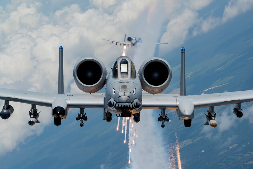 U.S. Air Force Capts. Andrew Glowa, lead, and William Piepenbring, both with the 74th Fighter Squadron out of Moody Air Force Base, Ga., fly two A-10C Thunderbolt II over the skies of southern Georgia, Aug. 18, 2014. Since it was first delivered to Davis-Monthan Air Force Base, Ariz., in October 1975, the A-10 has participated in operations Desert Storm, Southern Watch, Provide Comfort, Desert Fox, Noble Anvil, Deny Flight, Deliberate Guard, Allied Force, Enduring Freedom and Iraqi Freedom. (U.S. Air Force photo by Staff Sgt. Jamal D. Sutter/Released)  