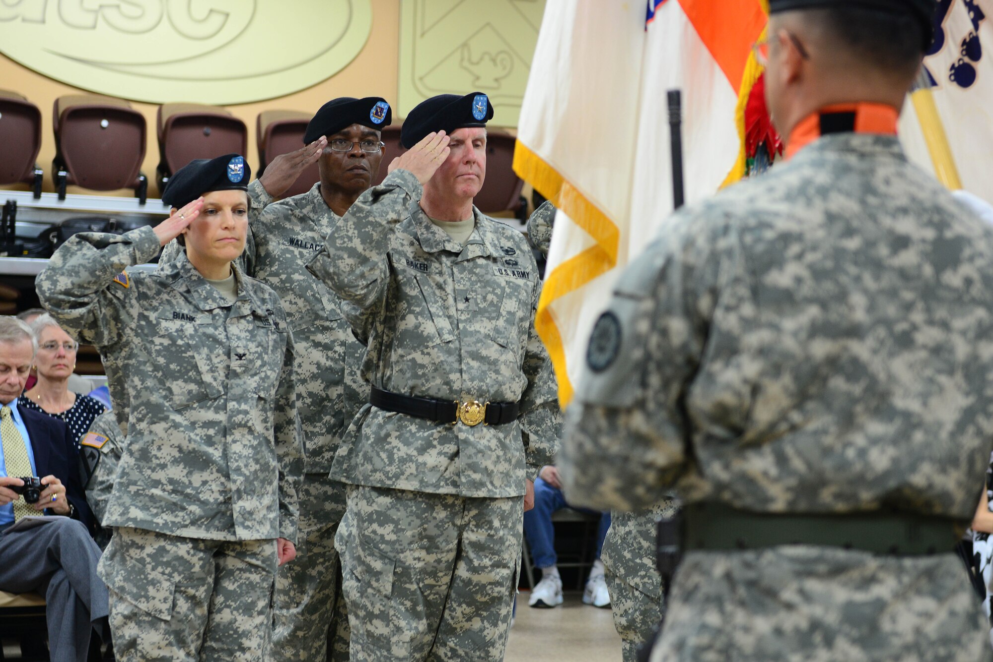 From left, U.S. Army Col. Maria A. Biank, 93rd Signal Brigade outgoing commander, Command Sgt. Maj. Ricky Wallace, 93rd Sig. Bde. outgoing command seargent major, and Brig. Gen. John W. Baker, 7th Signal Command (Theater) commanding general, salute during a change of command and responsibility ceremony at Fort Eustis, Va., August 15, 2014. Biank relinquished command to Col. Frank J. Snyder during the ceremony, while Wallace passed on responsibility to Command Sgt. Maj. Carlos M. Medina. (U.S. Air Force photo by Airman 1st Class Kimberly Nagle/Released) 