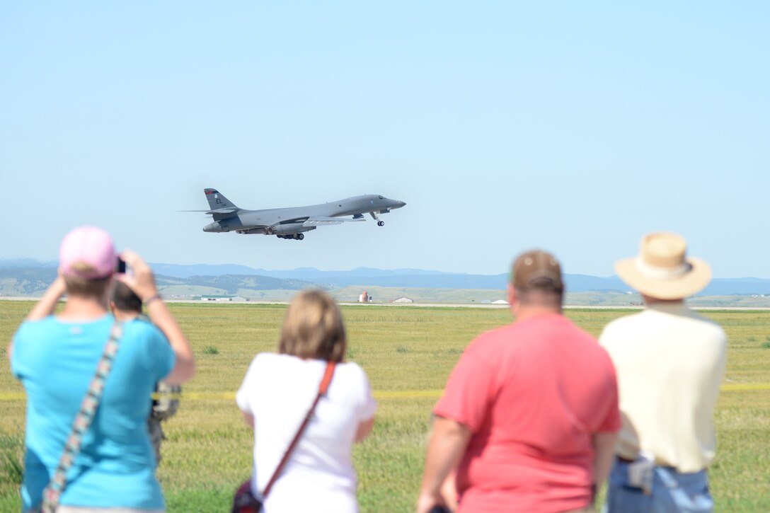 Members of the Black Hills Community gather for the take-off of the B-1 bomber during Ellsworth’s Black Hills Community Appreciation Day, Aug. 16, 2014. The event was open for all members of the community to come on base and learn more about Ellsworth’s mission, as well as give the Airmen a chance to tank the surrounding communities for their support of the base. (U.S. Air Force Photo by Airman 1st Class Rebecca Imwalle/ Released)