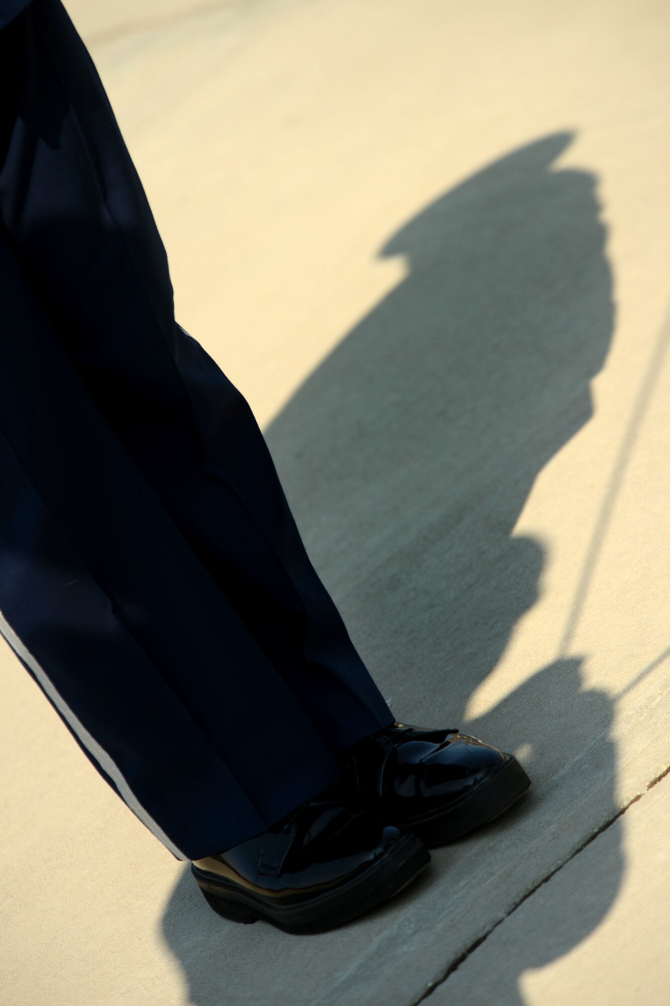 A 20th Force Support Squadron base honorguardsman stands at the position of attention during a retreat ceremony at Shaw Air Force Base, S.C., Aug. 7, 2014. The 20th Mission Support Group, lead by Col. Scott Arcuri, 20th MSG commander, participated in a retreat ceremony as part of a yearly tradition. (U.S. Air Force photo by Airman 1st Class Jensen Stidham/Released)