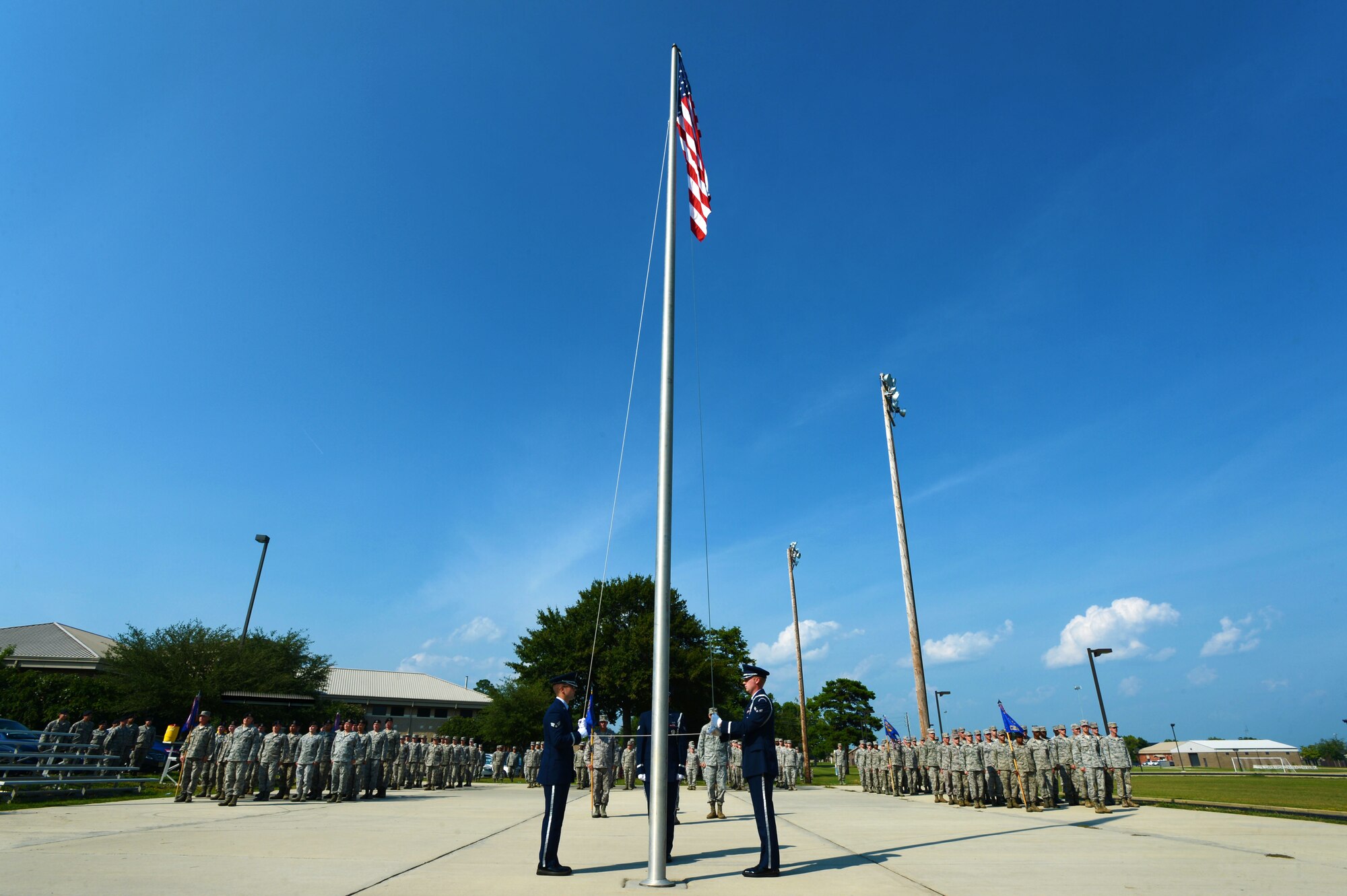 Squadrons that are part of the 20th Mission Support Group stand in formation during a retreat ceremony at Shaw Air Force Base, S.C., Aug. 7, 2014. The 20th MSG supports more than 5,400 military and civilian employees and 11,000 family members. (U.S. Air Force photo by Airman 1st Class Jensen Stidham/Released)
