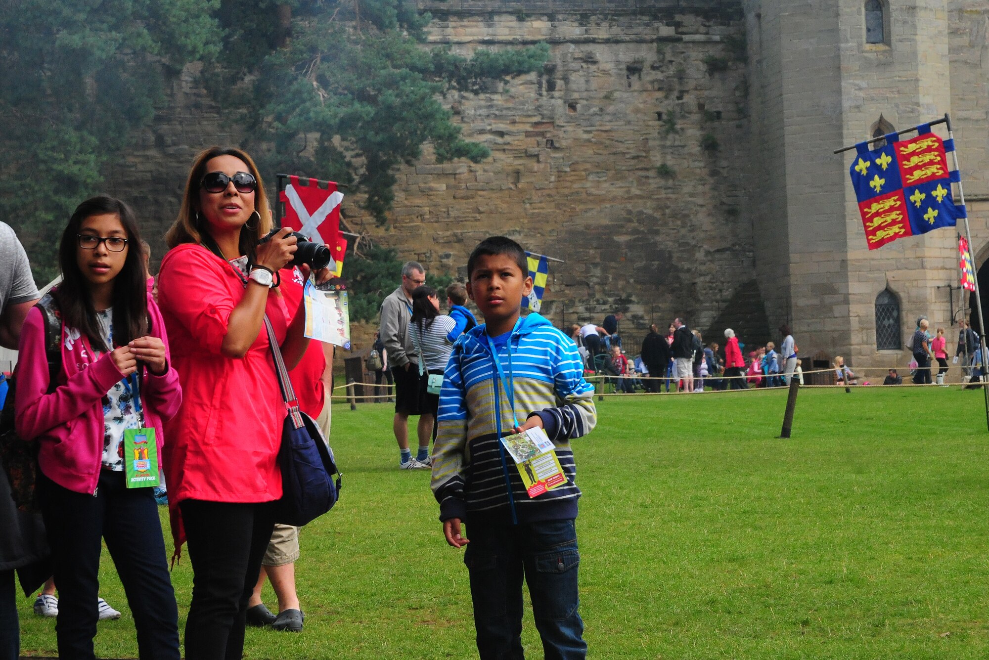 A deployed Airman’s family from Royal Air Force Lakenheath, England, stops to take in the sights during a 48th Fighter Wing Chaplain Corps resiliency trip to Warwick Castle, Aug. 14, 2014. Families met others that were experiencing similar circumstances while also experiencing British culture and heritage.  (U.S. Air Force Photo by Airman 1st Class Amanda Sampson/Released)