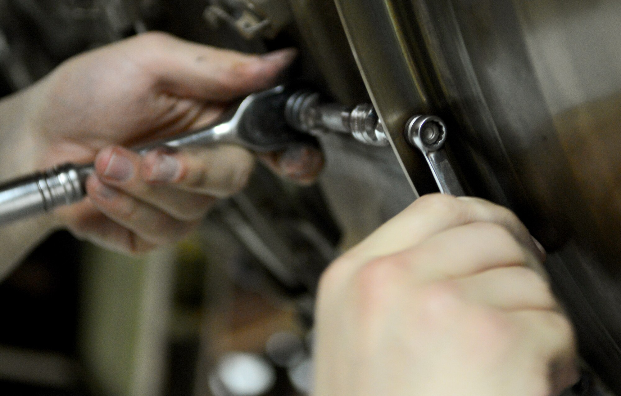 U.S. Air Force Airman 1st Class Joshua Heffernan, 100th Maintenance Squadron aerospace propulsion apprentice from Syracuse, N.Y., tightens a nut on a KC-135 Stratotanker engine during an isochronal inspection Aug. 14, 2014, on RAF Mildenhall, England. Each part of the aircraft is meticulously checked over for any defects which could cause the plane to be unfit for flight during an ISO inspection which occurs at set intervals for each plane. (U.S. Air Force photo/Airman 1st Class Dillon Johnston/Released)