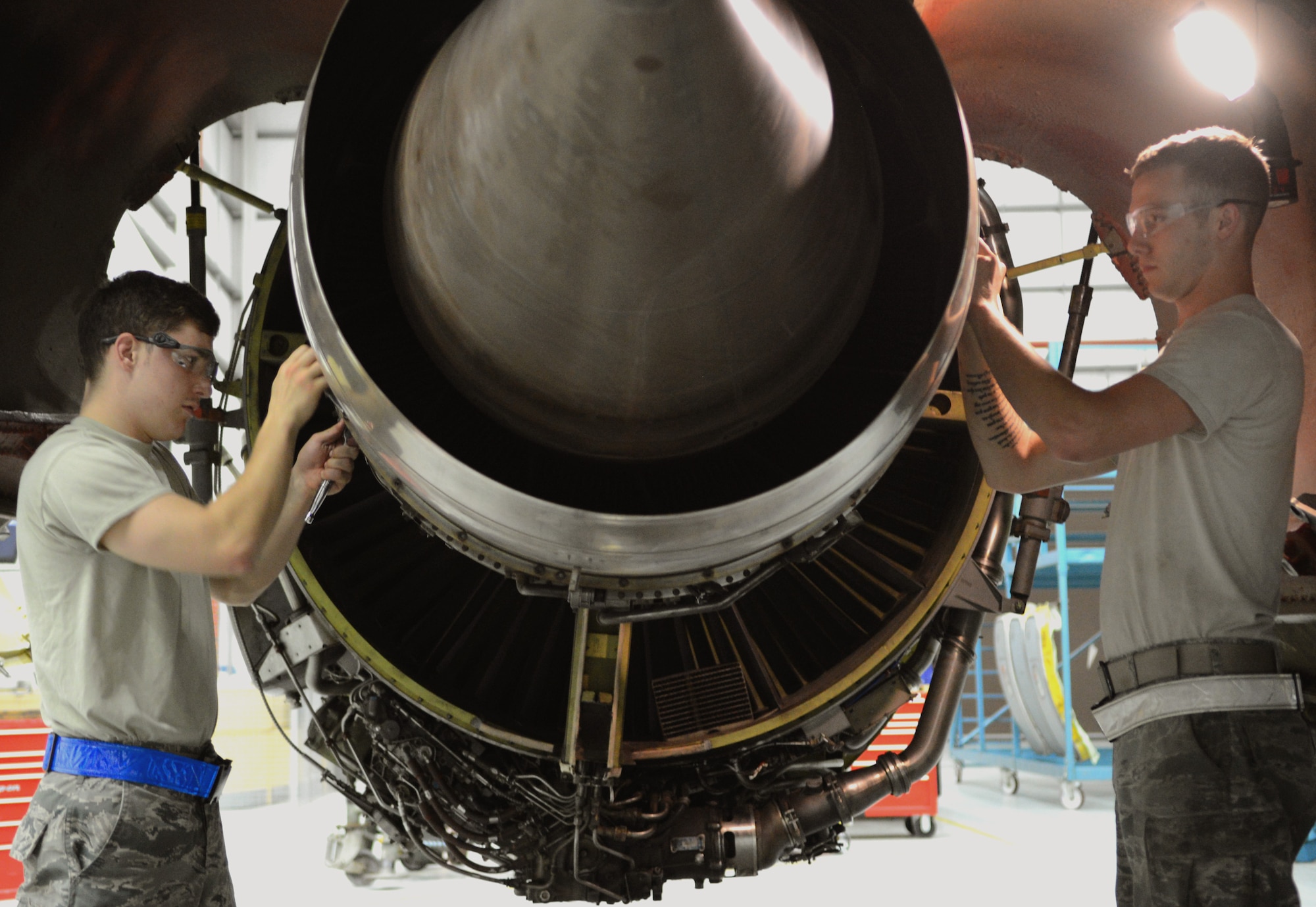 U.S. Air Force Airman 1st Class Joshua Heffernan, left, 100th Maintenance Squadron aerospace propulsion apprentice from Syracuse, N.Y., and U.S. Air Force Airman 1st Class James Greer, 100th MXS aerospace propulsion journeyman from McAllister, Okla., work on a KC-135 Stratotanker engine during an isochronal inspection Aug. 14, 2014, on RAF Mildenhall, England. Aircraft undergo ISO inspections, which occur at set intervals for each plane, to ensure they are mission-ready and safe to fly. (U.S. Air Force photo/Airman 1st Class Dillon Johnston/Released)