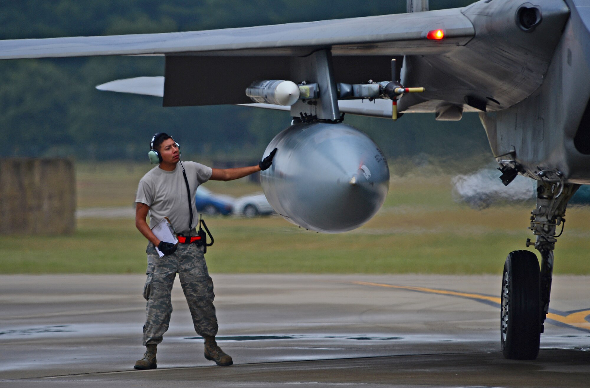 A 748th Aircraft Maintenance Squadron crew chief inspects an external fuel pod on a 493rd Fighter Squadron F-15C Eagle before it departs Royal Air Force Lakenheath, Aug. 15, 2014, to participate in bilateral training with the Bulgarian air force at Graf Ignatievo Air Base, Bulgaria. The 48th Fighter Wing operates under U.S. Air Forces in Europe’s philosophy of remaining Forward, Ready, Now by providing a continuous presence in Europe. This allows the U.S. Air Force to work with allies and partners to develop and improve ready air forces capable of maintaining regional security. (U.S. Air Force photo by Airman 1st Class Erin O’Shea/Released)
