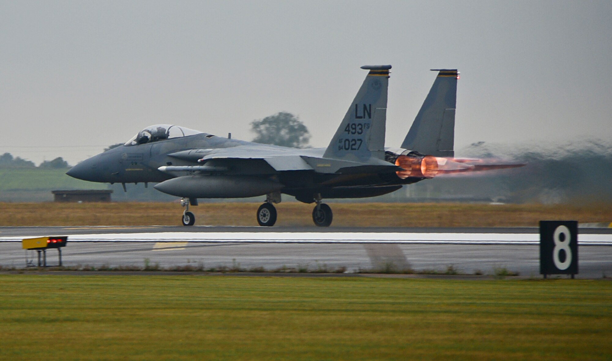 A 493rd Fighter Squadron F-15C Eagle takes off  from Royal Air Force Lakenheath, England, Aug. 15, 2014, for bilateral training at Graf Ignatievo Air Base, Bulgaria. The F-15 fighter pilots’ flying training deployment to Bulgaria focuses on maintaining joint readiness while building interoperability capabilities. (U.S. Air Force photo by Airman 1st Class Erin O’Shea/Released)