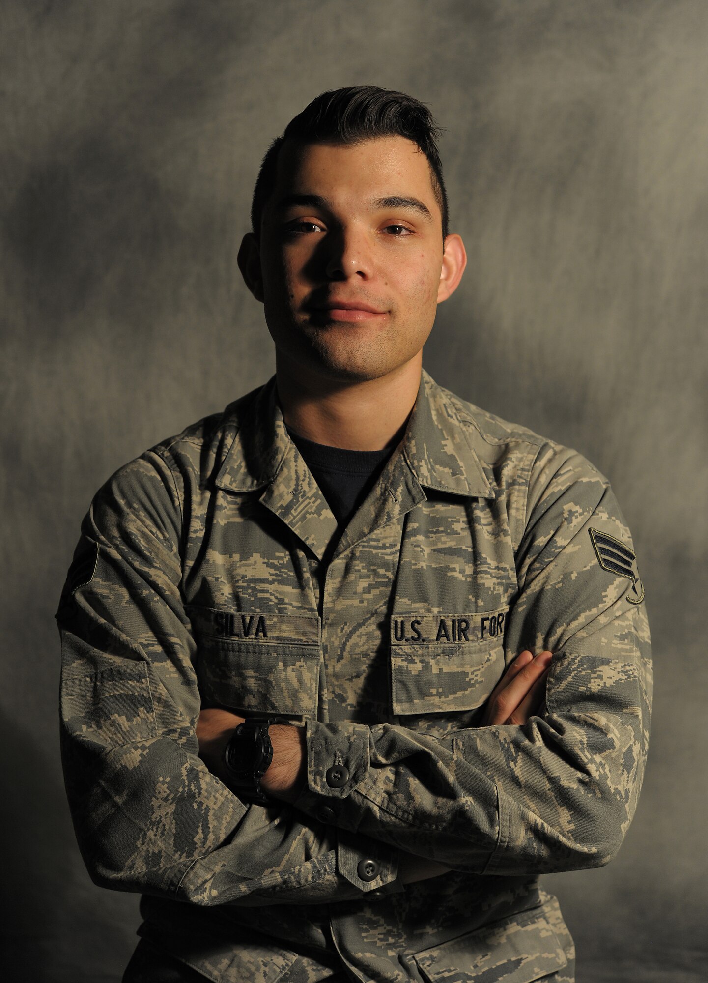 U.S. Air Force Senior Airman Christian Silva, an aerospace medical technician, poses for a photo Aug. 15, 2014, at Royal Air Force Lakenheath, England. While previously stationed at Misawa Air Base, Japan, Silva helped save the life of a U.S. Navy Sailor who collapsed from cardiac arrest at the base’s gym. (U.S. Air Force photo/Airman 1st Class Dana Butler)