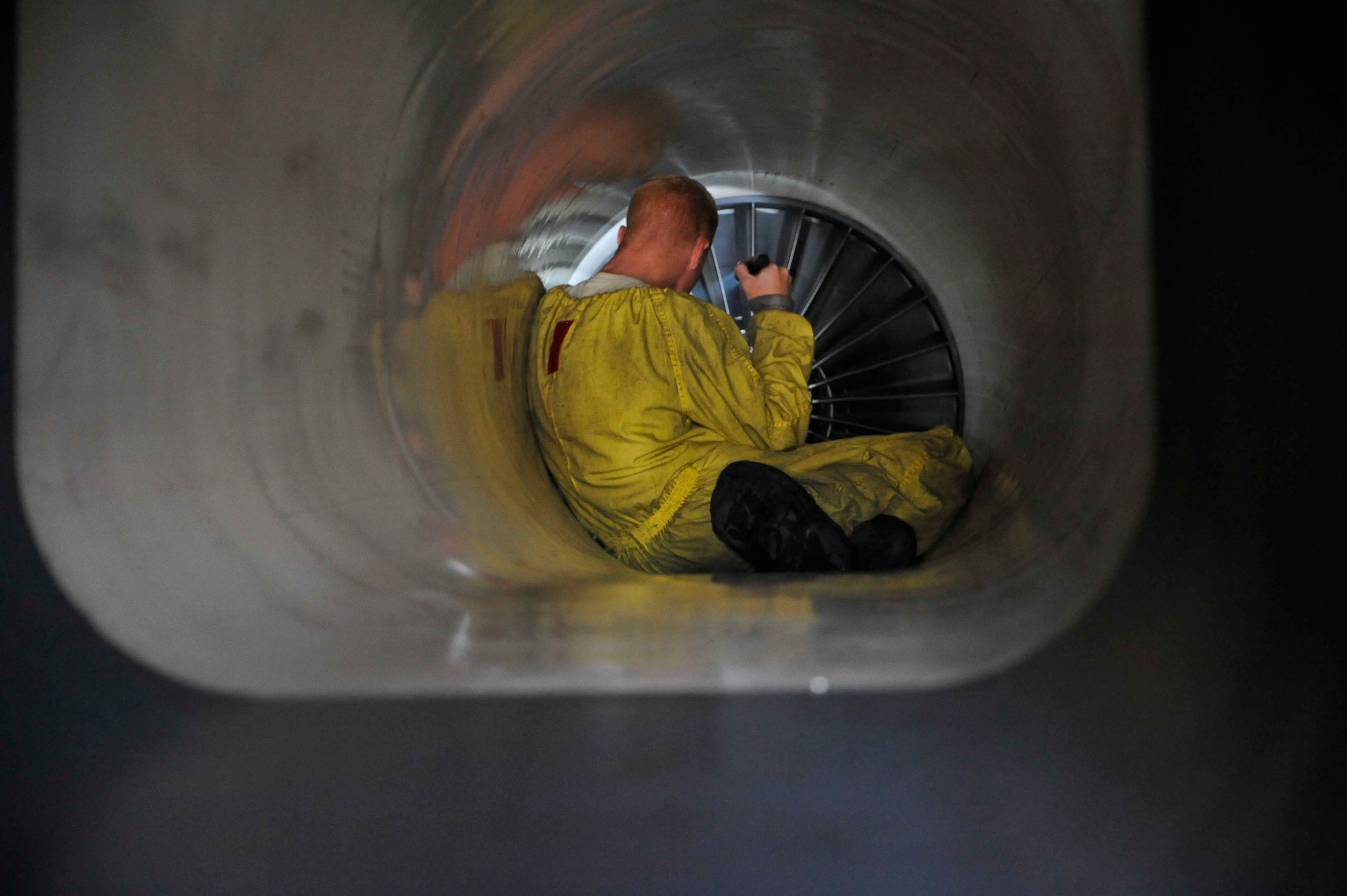 Staff Sgt. Mark Clements, 391st Aircraft Maintenance Unit crew chief, Mountain Home Air Force Base, Idaho, performs an intake inspection on an F-15 Strike Eagle after the aircraft completed a mission on Osan Air Base, Republic of Korea, Aug. 14, 2014. The jets are equipped with two intake ramps which are designed to generate a shock wave to aid the inlet compression process at supersonic speeds. (U.S. Air Force photo/Senior Airman David Owsianka)