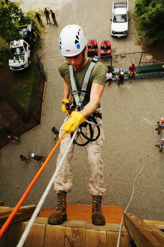 Cpl. Matthew Swearinger rappels from the tower of the Devil Dog Dare course at Marine Corps Air Station Cherry Point, N.C., Aug. 13, 2014. Swearinger is a air support operations operator with Marine Tactical Air Command Squadron 28 and native of Austin, Texas. 