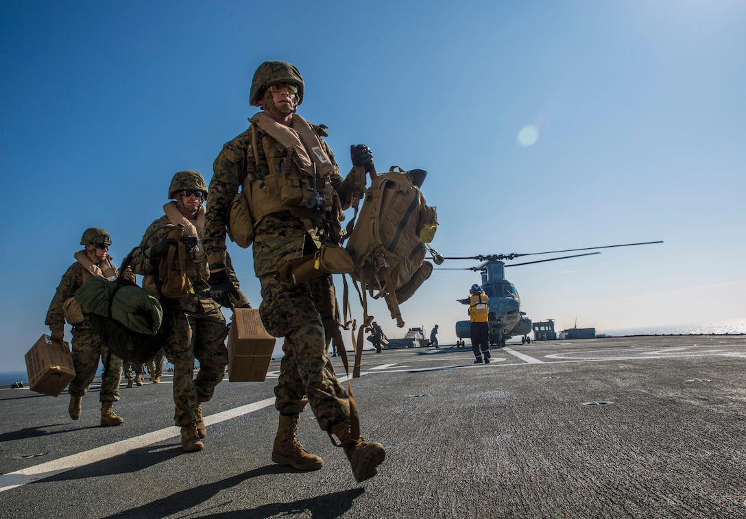 Marines from 1st Division, 23rd Marines disembark a CH-46E Sea Knight during a training evolution meant to simulate a natural disaster as part of Partnership of the Americas 2014. Representatives from Argentina, Brazil, Canada, Chile, Colombia, Mexico, Paraguay, and the United States are participating in POA 2014 from August 11-22, 2014. This exercise is designed to enhance joint and combined interoperability, increase the combined capability to execute Amphibious Operations, Peace Support Operations, and Humanitarian Assistance/Disaster Relief missions, and further develop strong and lasting relationships the U.S. Marine Corps has established with partner nation’s naval infantries/marine corps.