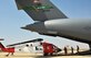 Soldiers and Airmen load a UH-60 Black Hawk into an Air Force C17 Globemaster III Aug. 19, 2104, at an old Israeli airstrip in the Sinai Peninsula of Egypt. The airstrip is now used by the Multinational Force and Observers stationed in Sinai Egypt. The Black Hawk was loaded into the belly of the C-17 and transported to Germany where it will undergo advanced maintenance. The C-17 is from the 62nd Airlift Wing, based out of Joint Base Lewis-McChord, Wash. (U.S. Army photo/Sgt. Thomas Duval)