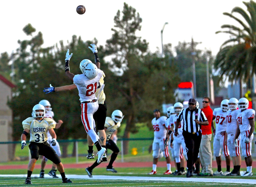 CAMP PENDLETON, Calif. -- The 1st Light Armored Reconnaissance Battalion Highlanders controlled the field and finished victorious, 28 – 8 against the 1st Marine Logistics Group Beast, during the 2nd week of the Commanding Generals Cup Football League, at the Paige Fieldhouse football field, Aug. 19.

