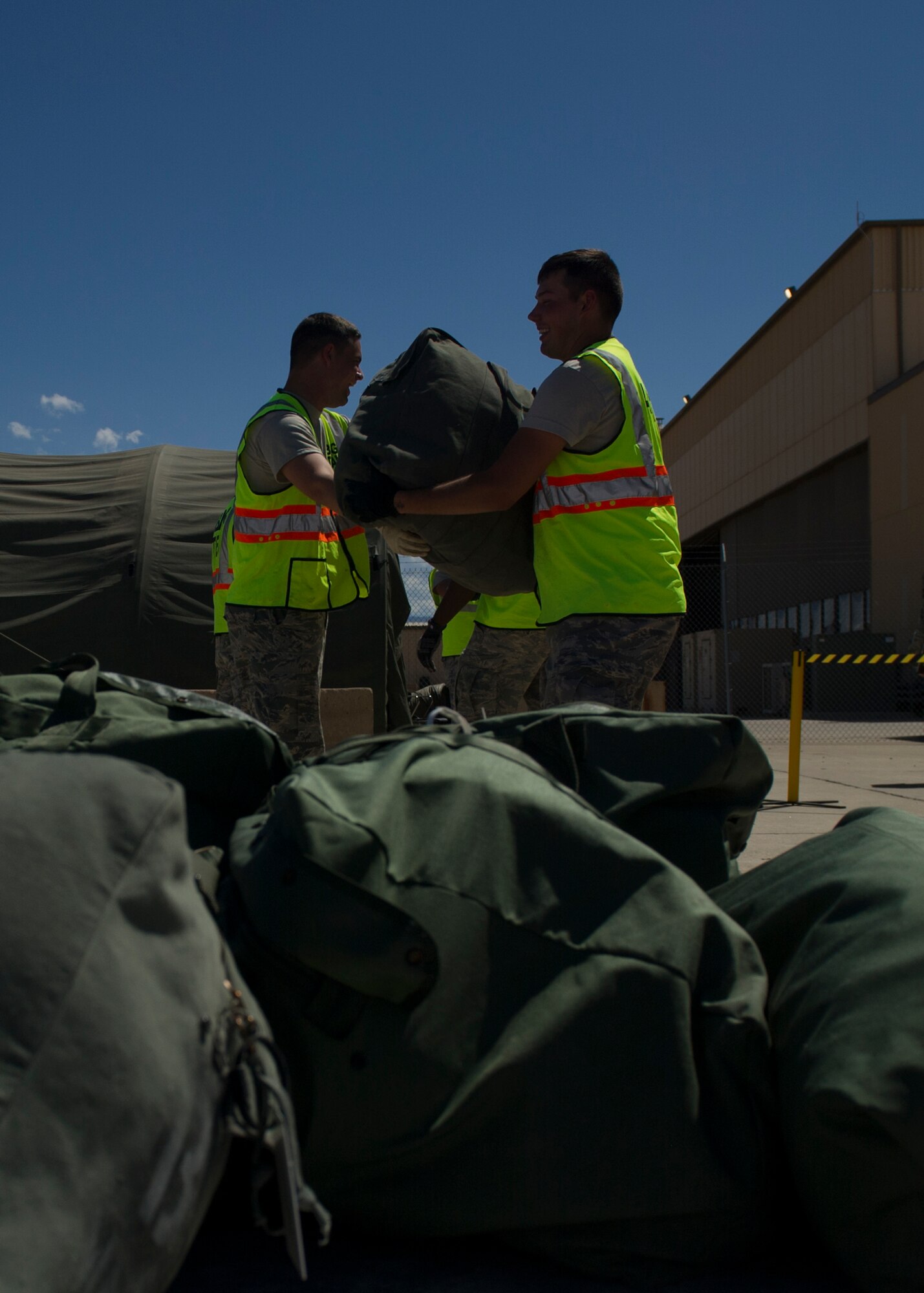 Members of Team Holloman participate in a three-day deployment exercise at Holloman Air Force Base, N.M., Aug. 19. The exercise was a part of the Air Force’s Commanders Inspection Program. The program is designed to test a unit’s ability to accomplish the mission with little warning, and provides feedback on areas of excellence or areas that need improvement. The program specifically focuses on the bases ability to rapidly deploy combat-ready Airmen and equipment world-wide. (U.S. Air Force photo by Senior Airman Leah Ferrante/ Released)