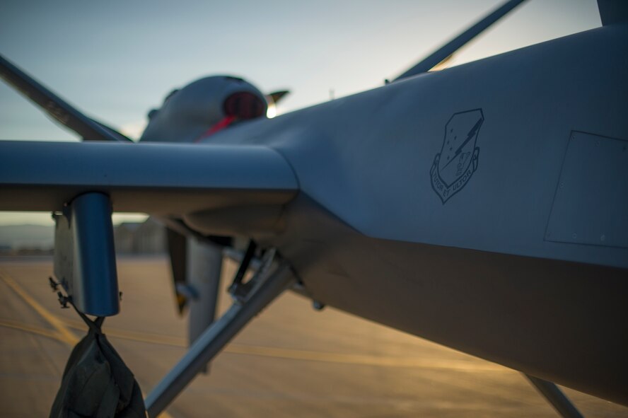 An MQ-9 Reaper sits on the flight line of Holloman Air Force Base, N.M., Aug. 19, prior to maintenance that will keep it flying and training the next generation of Air Force pilots and sensor operators. The MQ-9 Reaper is a medium-to-high altitude, long endurance unmanned aircraft system. The MQ-9's primary mission is as a persistent hunter-killer against emerging targets to achieve joint force commander objectives. The MQ-9's alternate mission is to act as an intelligence, surveillance and reconnaissance asset, employing sensors to provide real-time data to commanders and intelligence specialists at all levels.(U.S. Air Force photo by Airman 1st Class Aaron Montoya/Released)