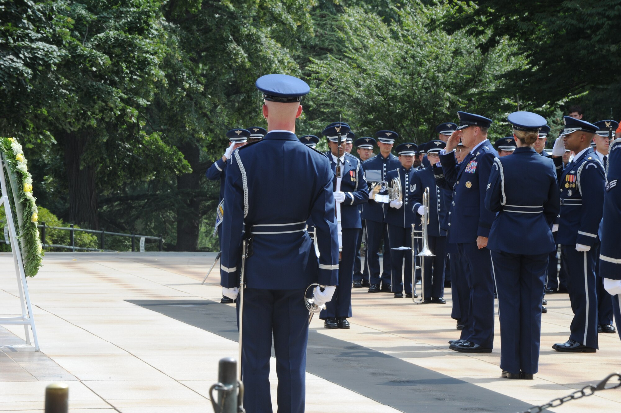 Air Force District of Washington Commander Maj. Gen. Darryl W. Burke salutes during a full-honors wreath ceremony at the Tomb of the Unknown Solider at Arlington National Cemetery in Arlington, Virginia, Aug. 19, 2014. Brazilian Air Force Commander Gen. Juniti Saito placed the wreath during the ceremony. (U.S. Air Force photo/Master Sgt. Tammie Moore)
