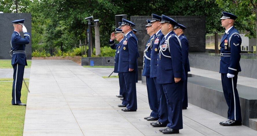 Capt. Alan Morford salutes Brazilian Air Force Commander Gen. Juniti Saito during a full-honors arrival ceremony in honor of Brazil at the Air Force Memorial in Washington, D.C., Aug. 19, 2014. During the ceremony Morford escorted Saito and Chief of Staff of the Air Force Gen. Mark A. Welsh III as they conducted an inspection of the troops. Morfod is the U.S. Air Force Honor Guard Drill Team flight commander.  (U.S. Air Force photo/Master Sgt. Tammie Moore)