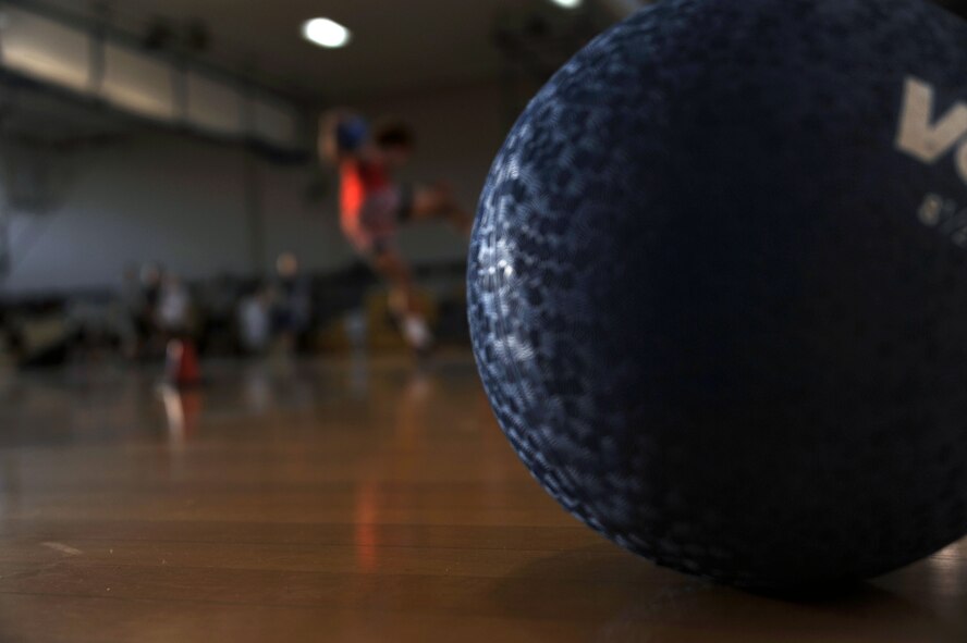 A dodge ball sits on the sidelines during the Maxwell-Gunter Dodge Ball Tournament at Maxwell Air Force Base, Ala., Aug. 15, 2014.The annual Maxwell-Gunter Dodge Ball Tournament grew in popularity with four more teams participating this year.( U.S Air Force photo by Airman 1st Class Alexa Culbert)