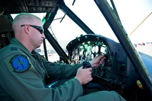 Capt. Samuel Shamburg, 40th Helicopter Squadron instructor pilot, sets the pressure altitude on an altitude indicator prior to flight Aug 11. The indicator assures the helicopters have proper altitude readings above sea level, allowing for safe flight when around other aircraft. (U.S. Air Force photo/Airman 1st Class Collin Schmidt)