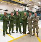 Team Malmstrom’s 40th Helicopter Squadron team poses for a photograph after a training session at the squadron’s maintnenance bay Aug. 11. The team is one of nine from Malmstrom Air Force Base that will be competing in the Air Force Global Strike Challenge. (U.S. Air Force photo/Airman 1st Class Collin Schmidt)