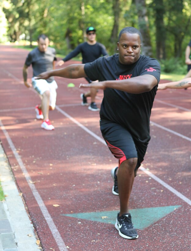 Marine Corps Sgt. Leon Pierce practices track drills during the Wounded Warrior Regiment's Warrior Athlete Reconditioning Program in Portland, Ore., Aug. 19, 2014. Pierce is assigned to Wounded Warrior Battalion-West.