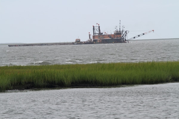 WACHAPREAGUE, Va. -- Cottrell Contracting Corporation's dredge Marion dredges Bradford Bay near Wachapreague Aug. 12, 2014. The Norfolk District, U.S. Army Corps of Engineers contracted with Cottrell to dredge Bradford Bay, Finney Creek and Wachapreague Channels, which had silted over. (U.S. Army photo/Gerald Rogers) 