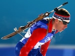 Sgt. Jeremy Teela enters the stadium in the 10K sprint biathlon race during the 2002 Winter Olympic Games in Salt Lake City, Utah. Teela, a member of the Vermont National Guard, finished 20th overall, which is the second best American finish ever in that event.