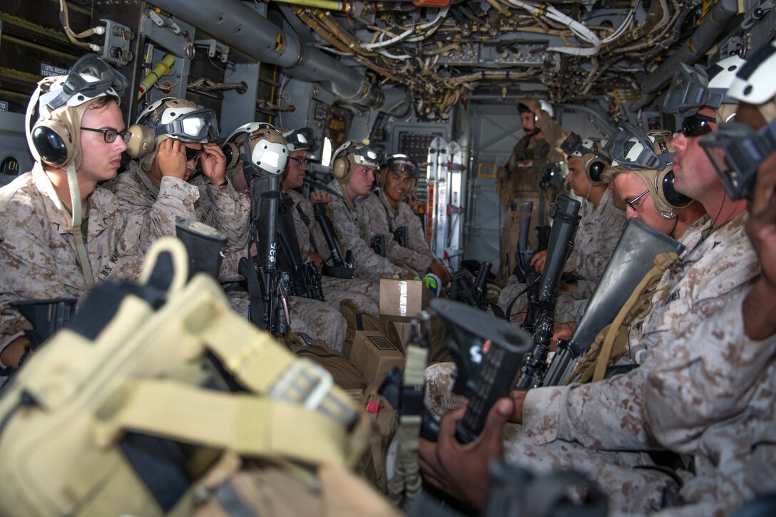 Marines with Combat Logistics Battalion 15 prepare for take off in an MV-22B Osprey with Marine Medium Tiltrotor Squadron (VMM) 161 “Greyhawks,” before a flight to Bryant Field Airport in Bridgeport, Calif., Aug. 20. Pilots used the added weight for familiarization when flying at higher altitudes. This allowed them to get a better feel for how their aircraft would maneuver and handle with extra weight.