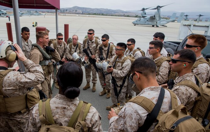 Marines assigned to Combat Logistics Battalion 15 receive a brief during a movement to Marine Corps Mountain Warfare Training Center from Marine Corps Air Station Camp Pendleton, Calif., on Aug. 19, 2014. These Marines will participate in Mountain Exercise at MCMWTC aboard Bridgeport, Calif.  (U.S. Marine Corps photo by Sgt. Emmanuel Ramos/Released)