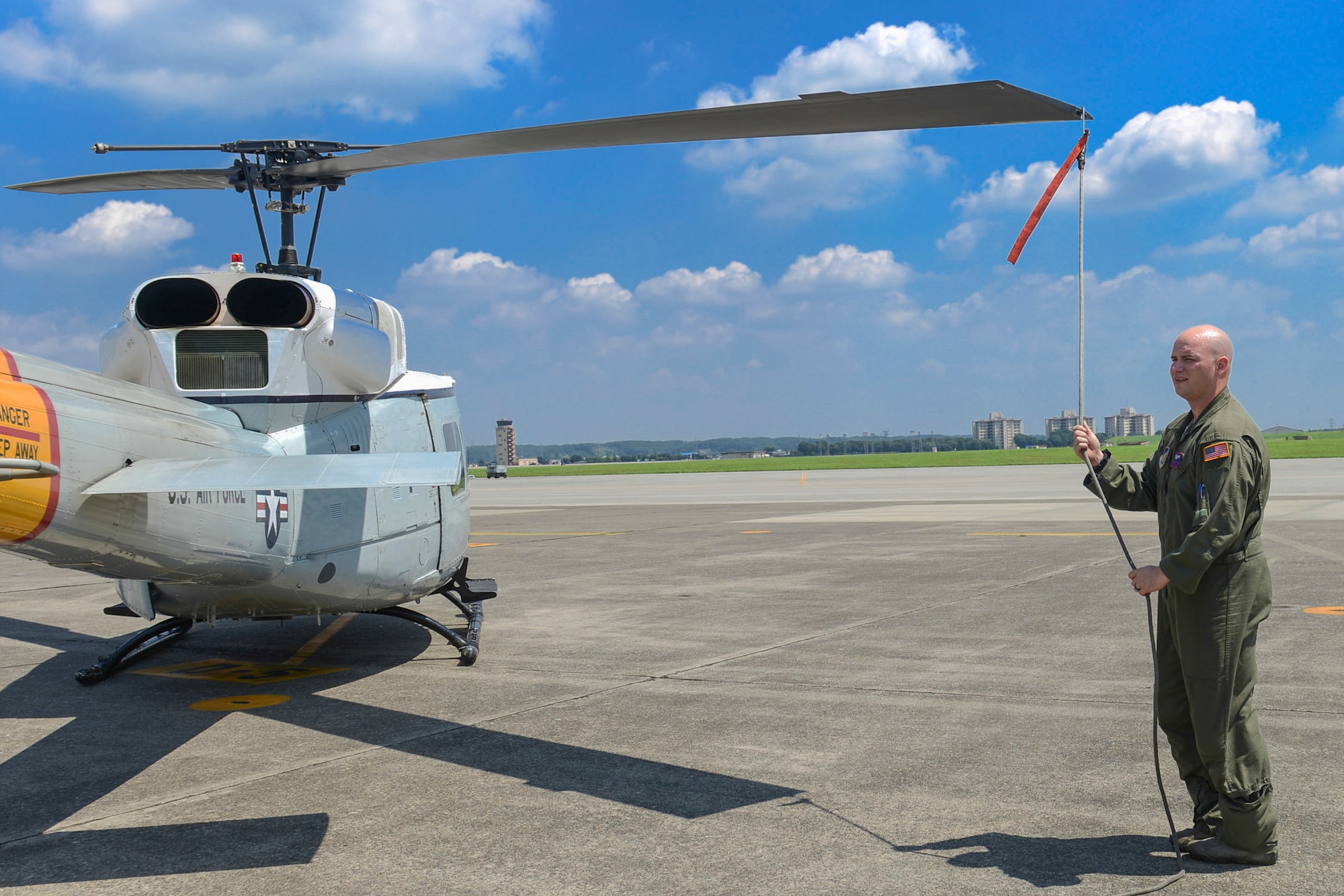 Staff Sgt. Christopher Rector, 459th Airlift Squadron flight engineer, performs a pre-flight inspection at Yokota Air Base, Japan on Aug. 20, 2014. Airmen from the 459 AS regularly practice their airlift capabilities in order to respond to regional contingencies. (U.S. Air Force photo by Airman 1st Class Meagan Schutter/Released)