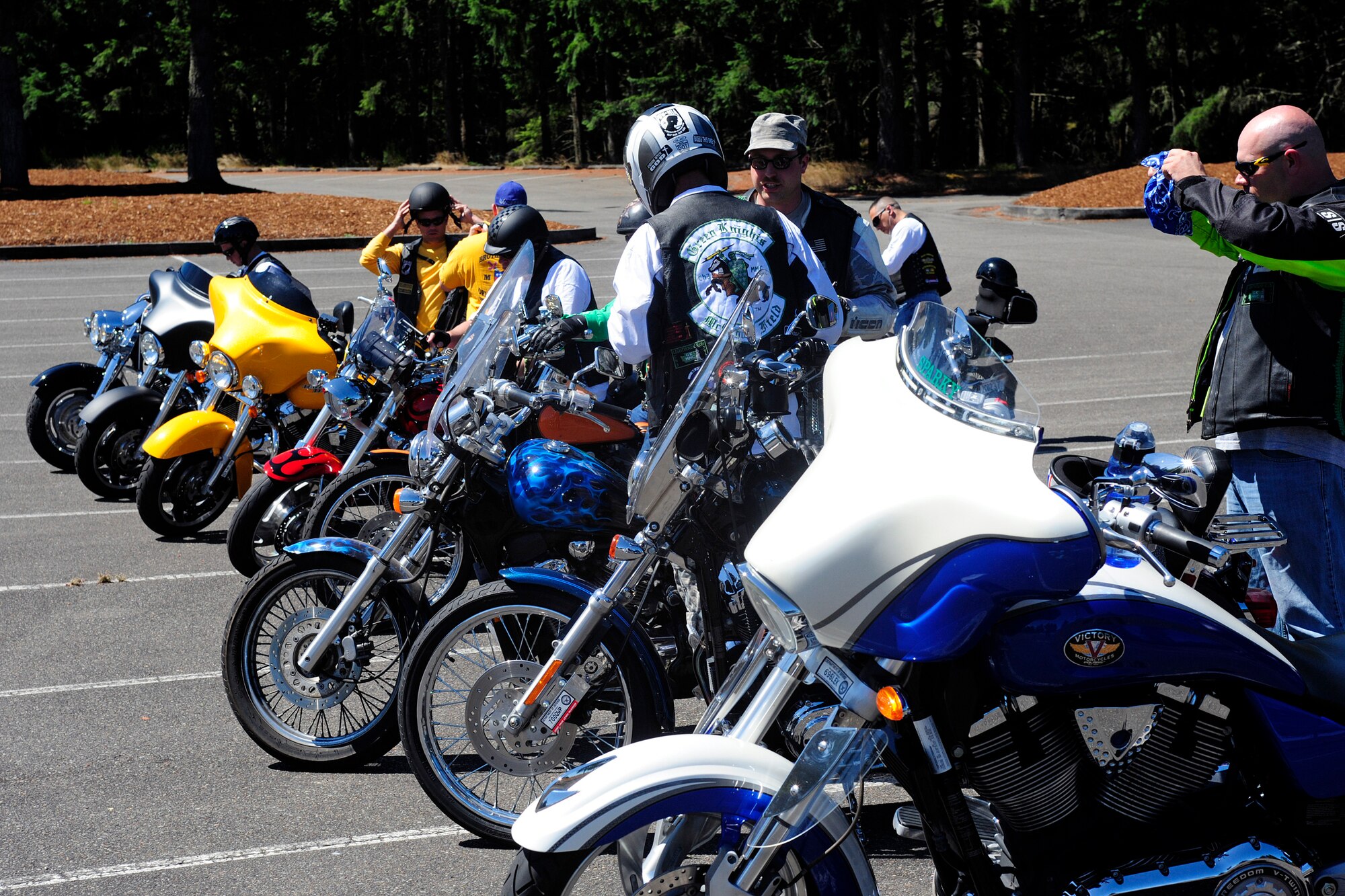 Team McChord motorcycle riders prepare to depart McChord Field during a motorcycle safety ride Aug. 1, 2014, at Joint Base Lewis-McChord, Wash. The ride was done to bring less experienced riders together with more experienced riders to promote safety and unity amongst motorcycle enthusiasts. (U.S. Air Force photo/Staff Sgt. Rebecca Roa-Griffith)  