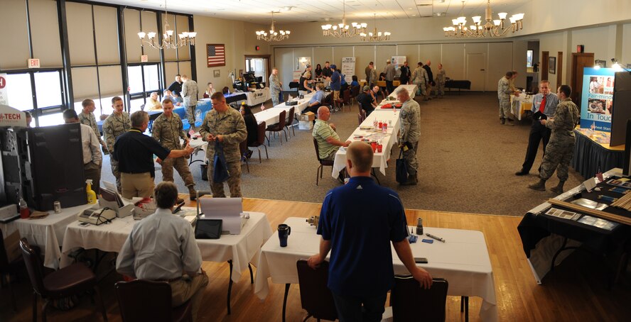 Local businesses display their company’s service offerings at the Dyess Event Center during the Small Business Outreach Program event Aug. 20, 2014, at Dyess Air Force Base, Texas. Thirty small businesses participated in the exposition to network and show what their companies could provide for the Air Force and Dyess. (U.S. Air Force photo by Airman 1st Class Alexander Guerrero/Released)