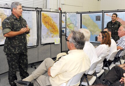 Brazilian Maj. Gen. Jorge Carlos, commander of the Fuerzas Aliadas PANAMAX 2014 Coalition Forces Land Component Command, conducts a mission presentation to members of the San Antonio Chamber of Commerce during their visit Aug. 11. More than 40 members of the chamber received a firsthand glimpse at the inner workings of U.S. Army South during a visit to its headquarters and to the Army South-led PANAMAX exercise headquarters
Photo by Robert Ramon  