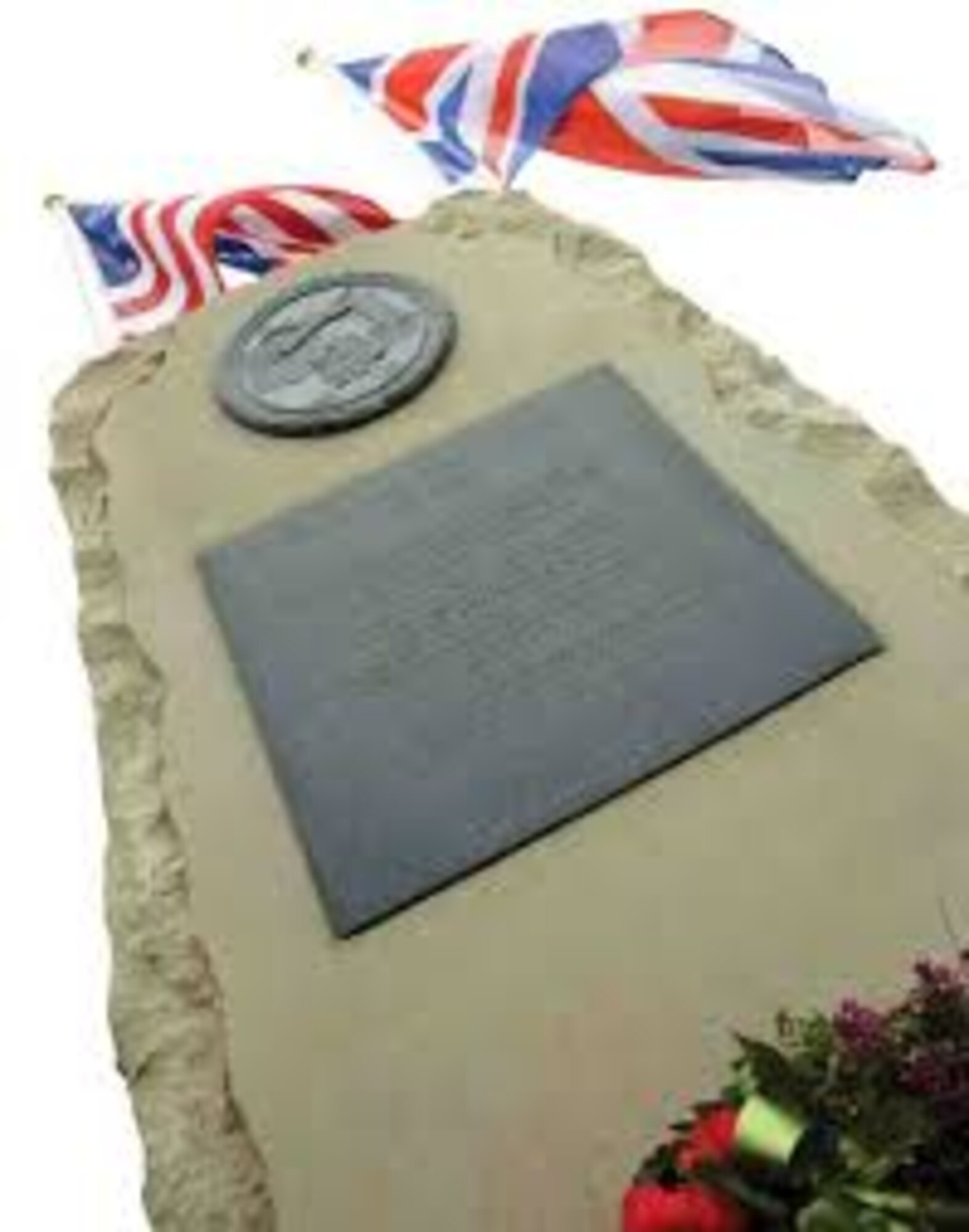 The stone memorial erected in honor of Capt. John Perrin July 4, 2007, Creswell, England. Perrin steered his failing aircraft away from the populated areas of Stafford and Creswell, England, resulting in the loss of his life. (Photo courtesy of the Creswell Parish Council)