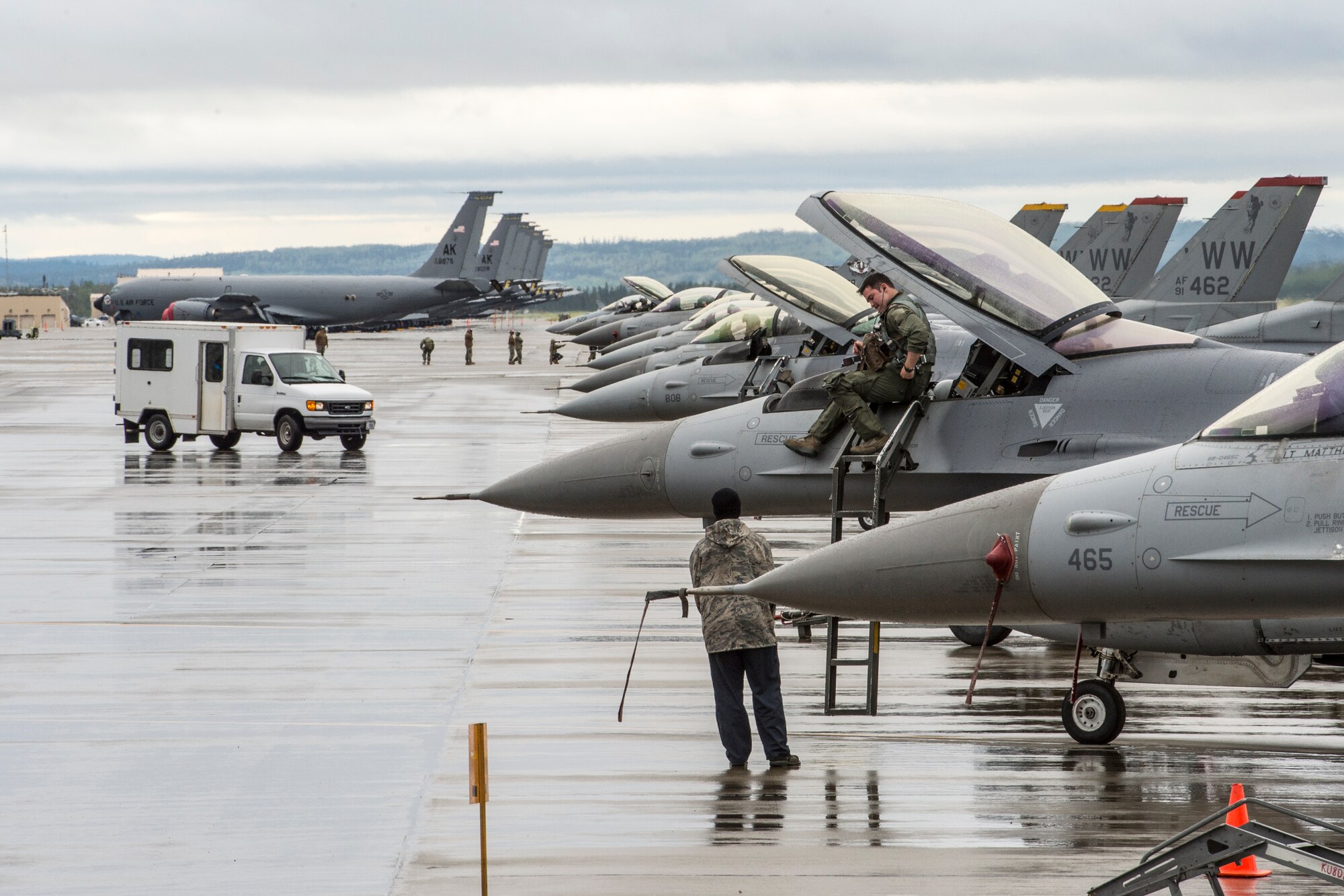 U.S. Air Force Capt. Logan Brewer, 80th Fighter Squadron F-16 Fighting Falcon pilot assigned to Kunsan Air Base, South Korea, prepares for a sortie during RED FLAG-Alaska 14-3 Aug. 19, 2014, Eielson Air Force Base, Alaska. Brewer flew combat training missions with pilots from the U.S. Marine Corps, U.S. Navy and Air National Guard. (U.S. Air Force photo by Senior Airman Peter Reft/Released)