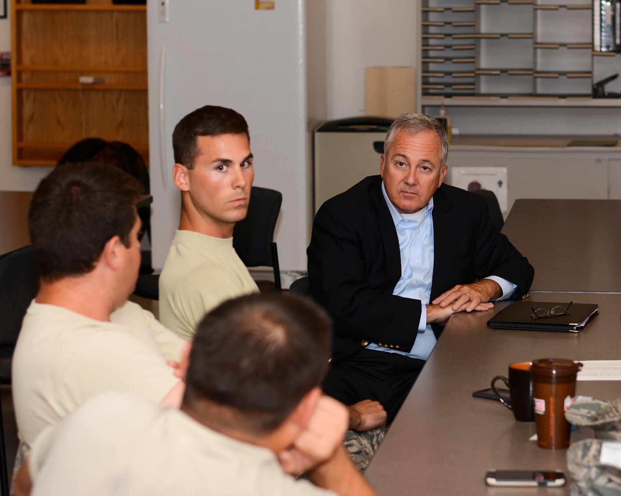 Senate Armed Services Committee Professional Staff Member Mr. Steve Barney sits down with maintenance crews from the 507th Air Refueling Wing and 137th Oklahoma Air National Guard.  Barney and other members from the SASC received feedback from members on topics such as bonus structure, staffing levels and training concerns.  (U.S. Air Force photo/Senior Airman Mark Hybers)
