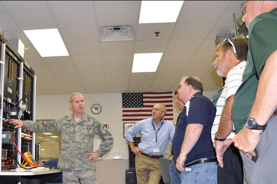 YOUNGSTOWN AIR RESERVE STATION, Ohio – Air Force Reserve Senior Master Sgt. Jason Willis, an avionics technician assigned to the 910th Maintenance Squadron, explains an aircraft instrument testing unit to a group of attendees during the 2nd Annual Joint Employer Awareness Event at the avionics shop here, Aug. 7, 2014. The two-day event, designed to give civilian employers of Air Force Reservists and Ohio National Guardsmen a better understanding of the mission their employees carry out as members of the U.S. Armed Forces, also gave attendees the opportunity to get an up-close look at both the 910th's facilities and the Ohio National Guard's Joint Military Training Center, located at nearby Camp Ravenna, Ohio. U.S. Air Force photo by Master Sgt. Bob Barko Jr.