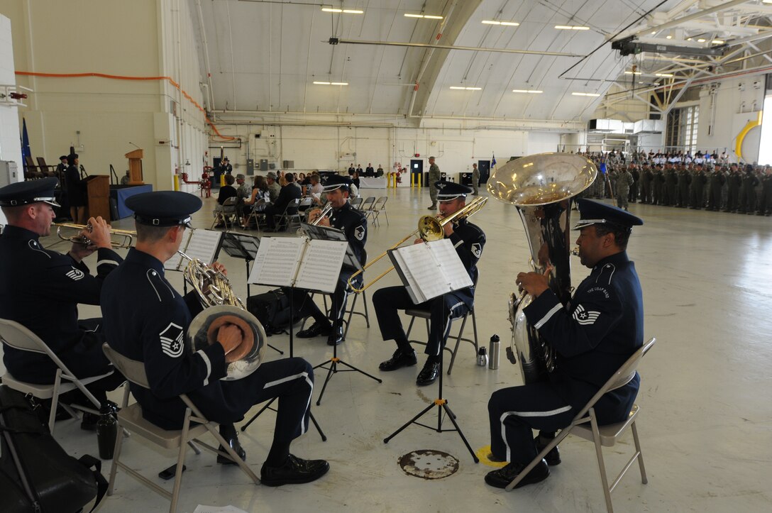 A quintet from the USAF Band's Ceremonial Brass provides musical support for the 459th Air Refueling Wing change of command ceremony. The ceremony took place at Joint Base Andrews, Hangar 10, August 16, 2014. (U.S. Air Force photo by Staff Sgt. Amber J. Russell). 