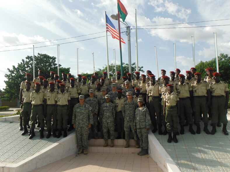 U.S. Army Cadets William Hamilton and Latia Jones assist Burkinabe officer cadets with English language skills at the Georges Namoano Military Academy in Burkina Faso in June 2014. The U.S. Army cadets were participating in the U.S. Army Cadet Command’s Cultural Understanding and Language Proficiency Program, which is designed to strengthen cultural awareness and foreign language skills among the Army’s future leaders. (Courtesy photo)