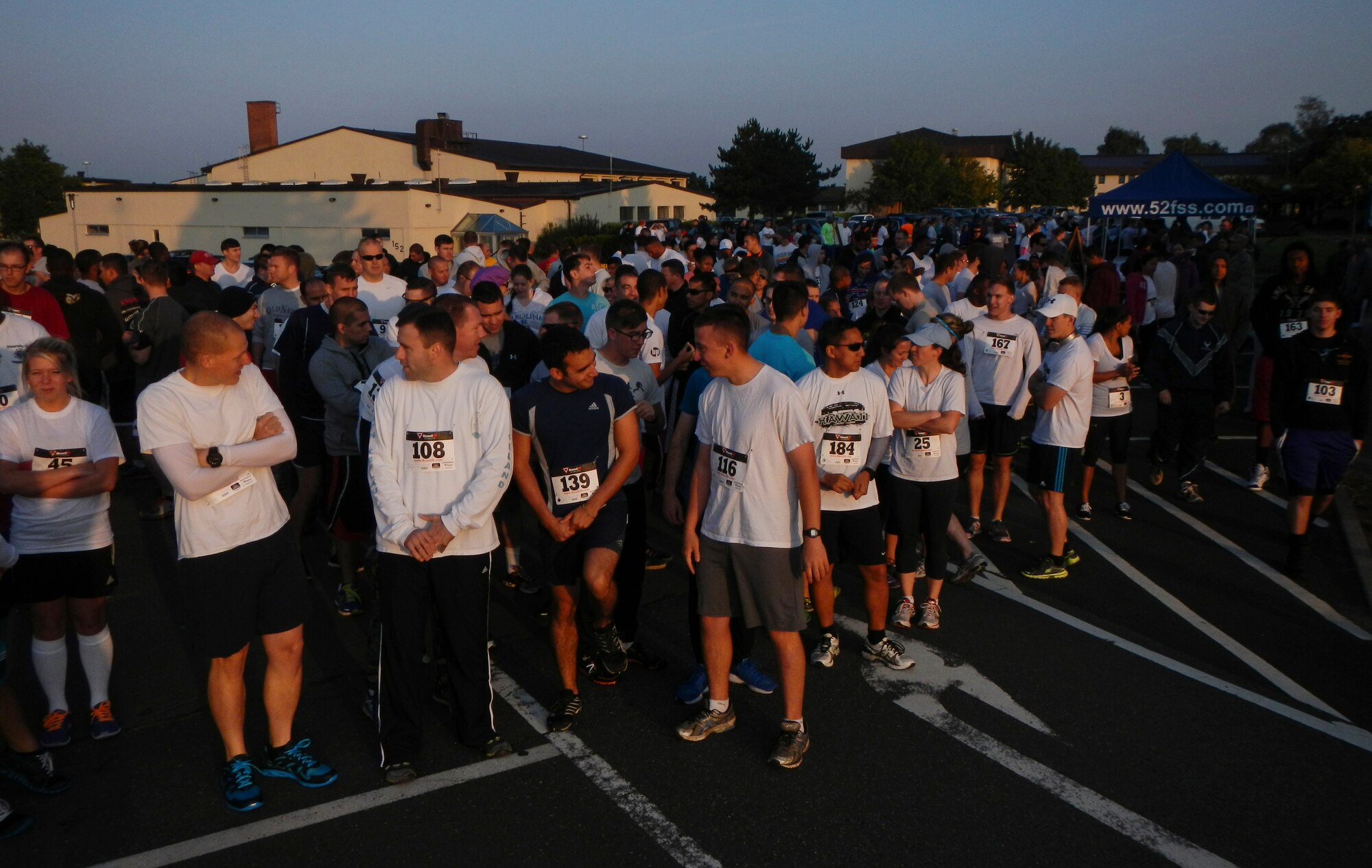 Color Run participants line up to begin the Diversity Day 5K Color Run Aug. 21, 2014, at Spangdahlem Air Base, Germany. The Color Run kicked off the first of many events to celebrate Diversity Day. (U.S. Air Force photo by Staff Sgt. Christopher Ruano/Released)