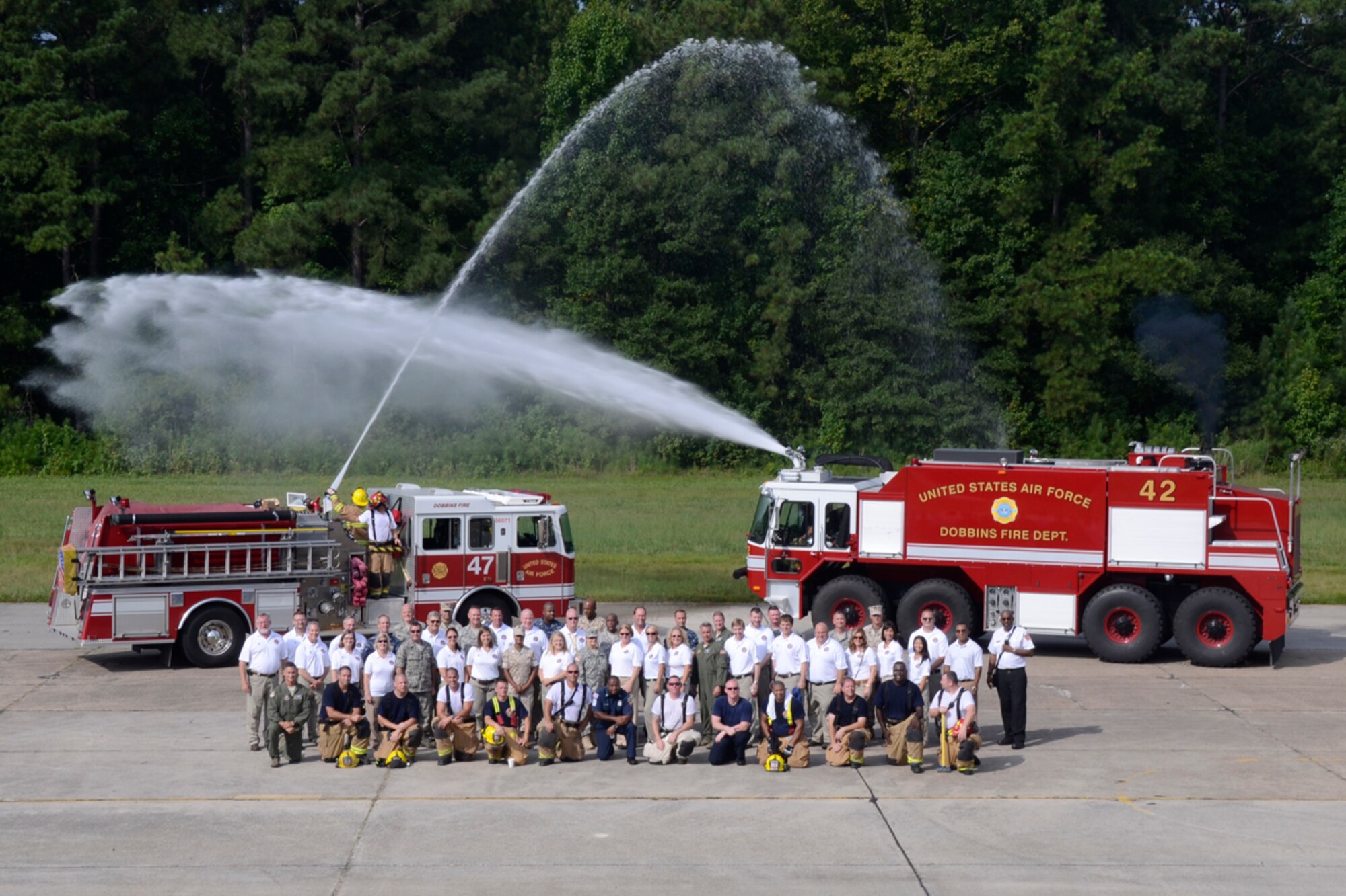 Members of the Honorary Commanders Association Class of 2014 participated in their annual Dobbins Day, visiting various units on Dobbins Air Reserve Base, Aug. 20, 2014. The community leaders experienced the Eastern Regional C-130 Simulator, the Base Fire department Training Site, the Force Support Combat Training Center, demonstrations by base Explosive Ordnance Disposal and toured a C-130 Hercules. Updates on current events were given by members of the 94th Aeromedical Evacuation Squadron, Emergency Management, Security Forces Squadron, and Intelligence Office. The HCA is a Cobb County Chamber of Commerce entity, whose main purpose is to take local civic leaders and introduce them to the U.S. military. (U.S. Air Force photo/Don Peek)