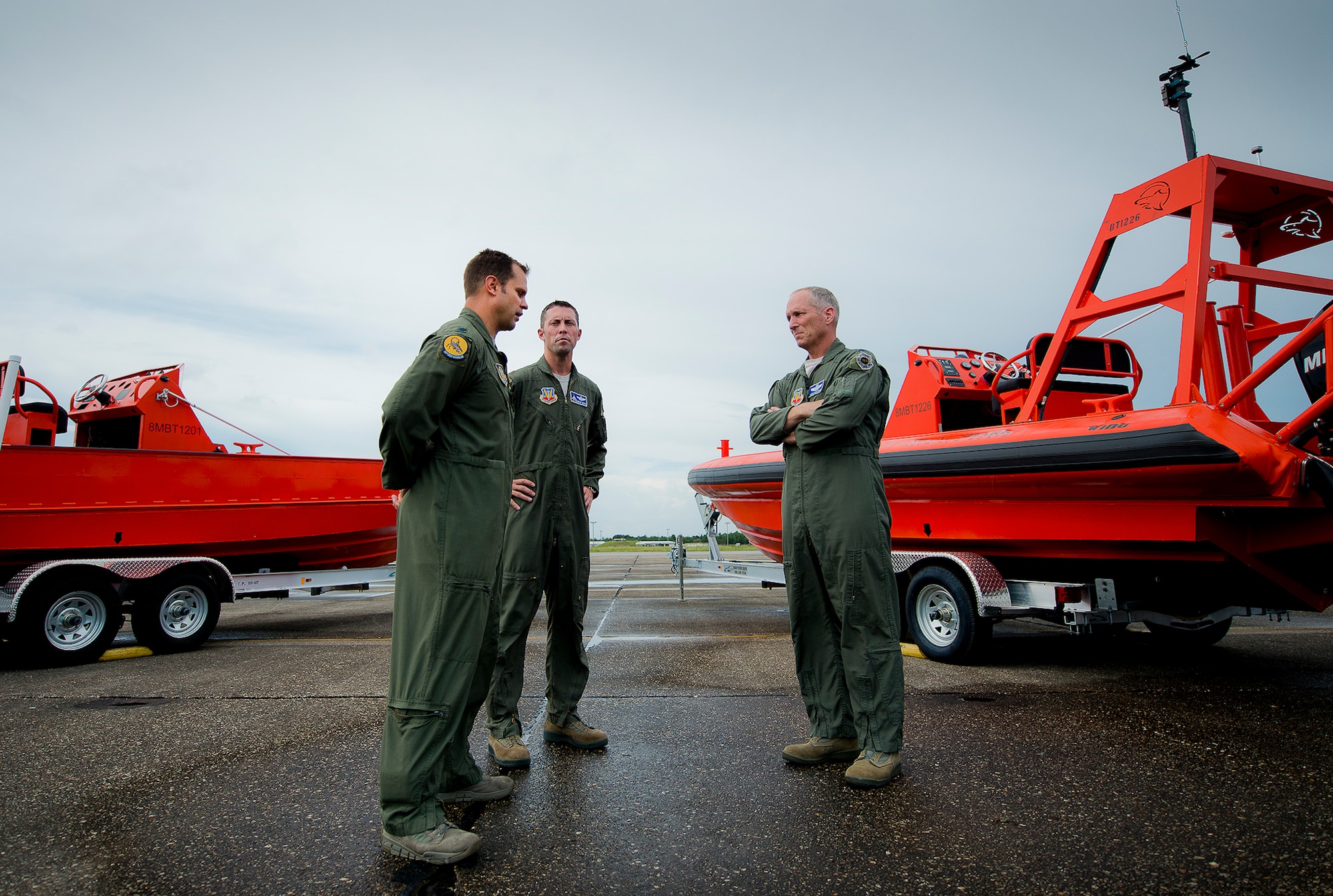 Gen. Michael Hostage, commander of Air Combat Command, receives a briefing from Lt. Col. Ben Wysack, 28th Test and Evaluation Squadron, and Maj. John Easton, 86th Fighter Weapons Squadron, about the 53rd Wing’s Combat Hammer boat operations program at Eglin Air Force Base, Fla., Aug. 18.  Hostage spent the entire day learning about the 53rd Wing mission and speaking with its Airmen.  (U.S. Air Force photo by Samuel King Jr.)