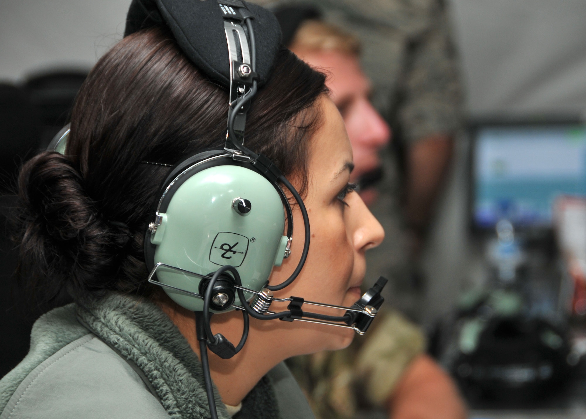 Air National Guard Senior Airman Sandra Guillen monitors air traffic on a radar screen for the 727th Expeditionary Air Control Squadron. The squadron recently upgraded its equipment from the BC3-E system (Battlespace Command and Control Center-Expeditionary) to the BC3-T (Battlespace Command and Control Center-Theater) system at the 380th Air Expeditionary Wing at an undisclosed location in Southwest Asia. (U.S. Air National Guard photo by Senior Master Sgt. Eric Peterson/Released)