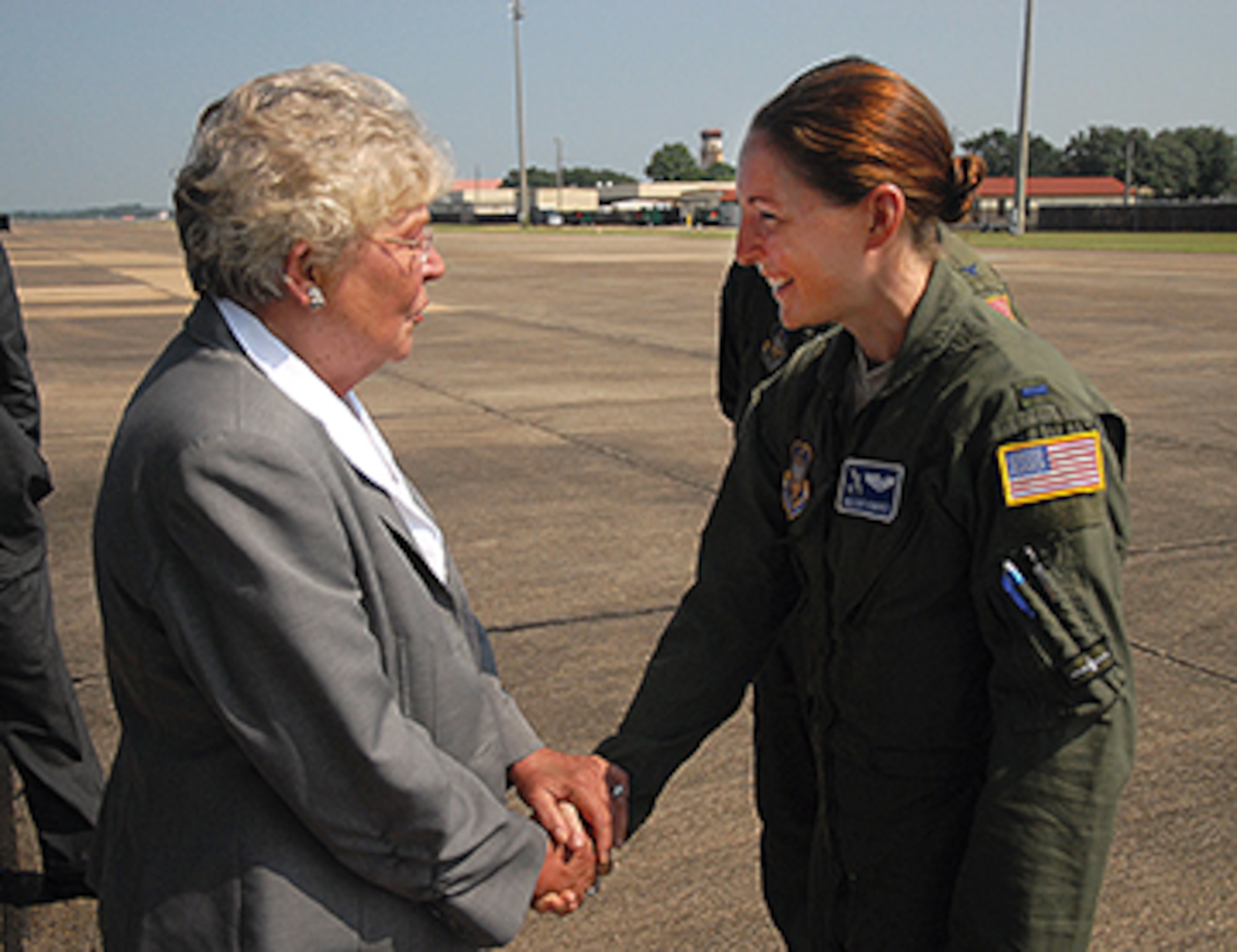 Alabama Lt. Gov. Kay Ivey meets with 1st Lt. Heather Kindred of the 357th Airlift Squadron during her C-130 tour. (Photo by Gene H. Hughes)