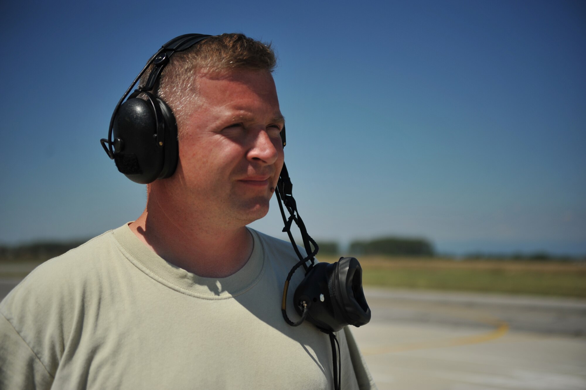 Tech. Sgt. Timothy Graham, 493rd Aircraft Maintenance Unit avionics craftsman, takes a moment to look at the flight line and enjoy the scenery Aug. 19, 2014. As an avionics craftsman, it’s Graham’s job to repair aircraft to keep them mission ready. (U.S. Air Force photo/Senior Airman Hailey Haux)
