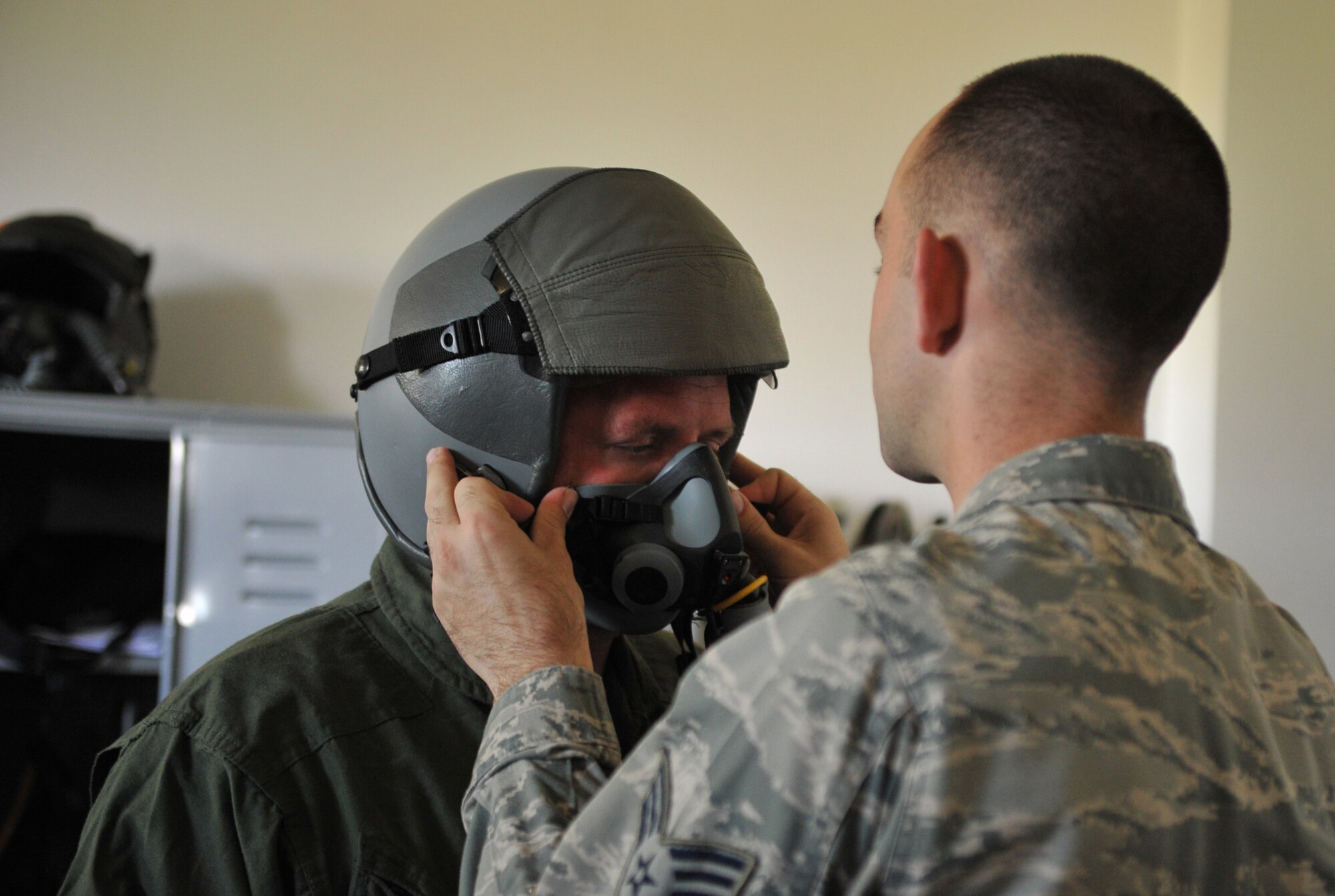 Tech. Sgt. Timothy Graham, 493rd Aircraft Maintenance Unit avionics craftsman, gets geared up for his incentive flight Aug. 18, 2014. Coming up on his retirement and last temporary duty to Plovdiv, Bulgaria where Airmen are conducting bilateral training, Graham was finally able to take that flight. (U.S. Air Force photo/Senior Airman Hailey Haux)