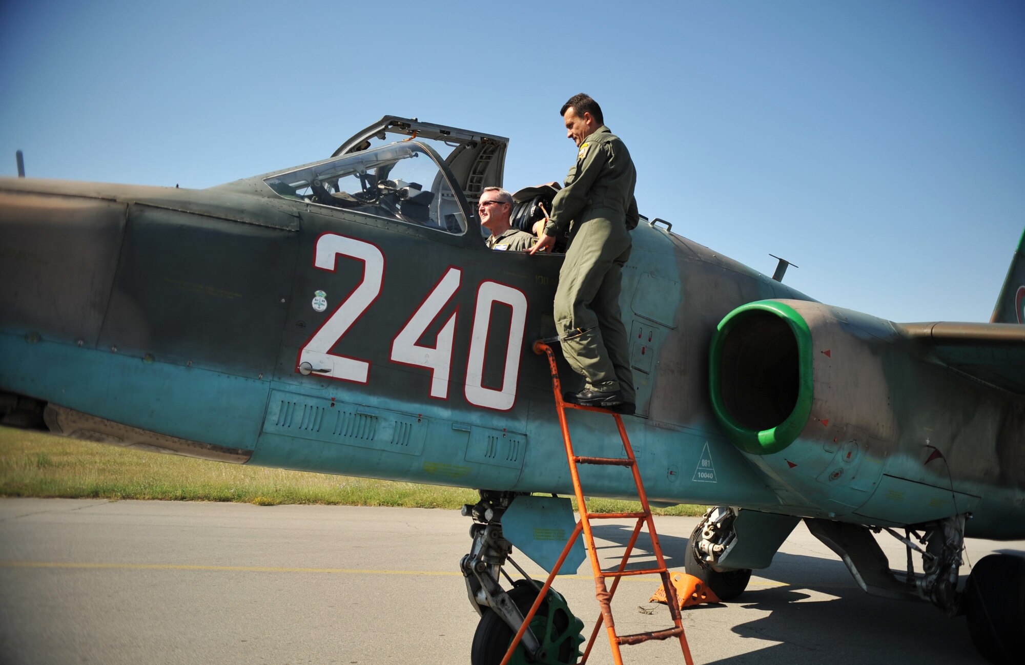 Lt. Gen. Darryl Roberson, 3rd Air Force commander, gets up close and personal with Bulgarian aircraft during a visit to Plovdiv, Bulgaria Aug. 20, 2014. As part of the visit, Roberson received a brief from Bulgarian Brig. Gen. Ivan Lalov, Graf Ignatievo Air Base commander, about the history of the base and how his Air Force plans to enhance interoperability with the U.S. (U.S. Air Force photo/Senior Airman Hailey Haux)