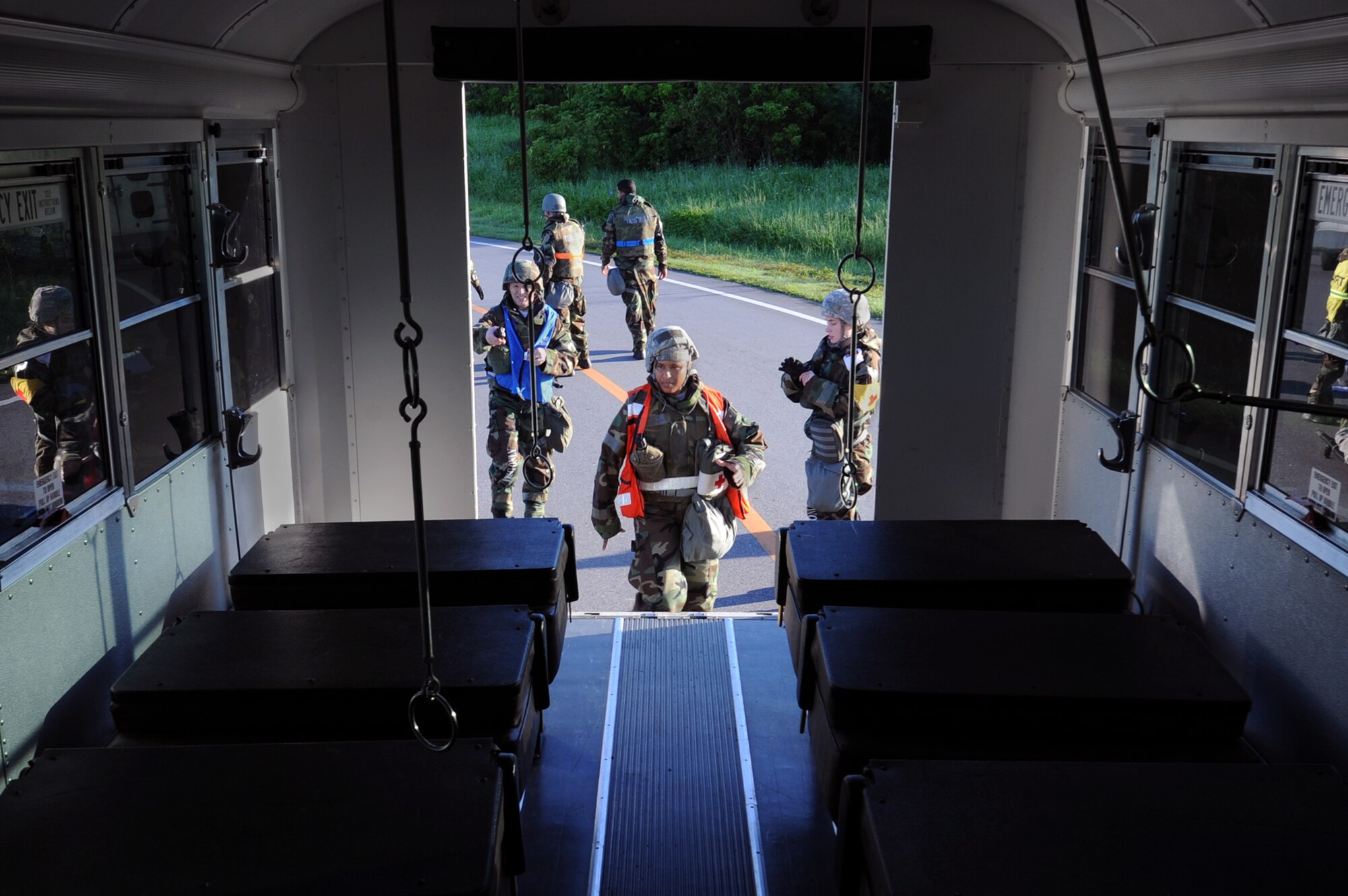 U.S. Air Force Capt. Marisol Pacheco, 18th Aerospace Medicine Squadron clinical nurse, prepares an am-bus to transport  simulated victims during a mass casualty exercise on Kadena Air Base, Japan, Aug. 21, 2014. Mass casualty exercises ensure emergency response personnel such as the 18th Medical Group’s field response team are prepared for real-world contingencies. (U.S. Air Force photo by Airman 1st Class Zade C. Vadnais/Released)