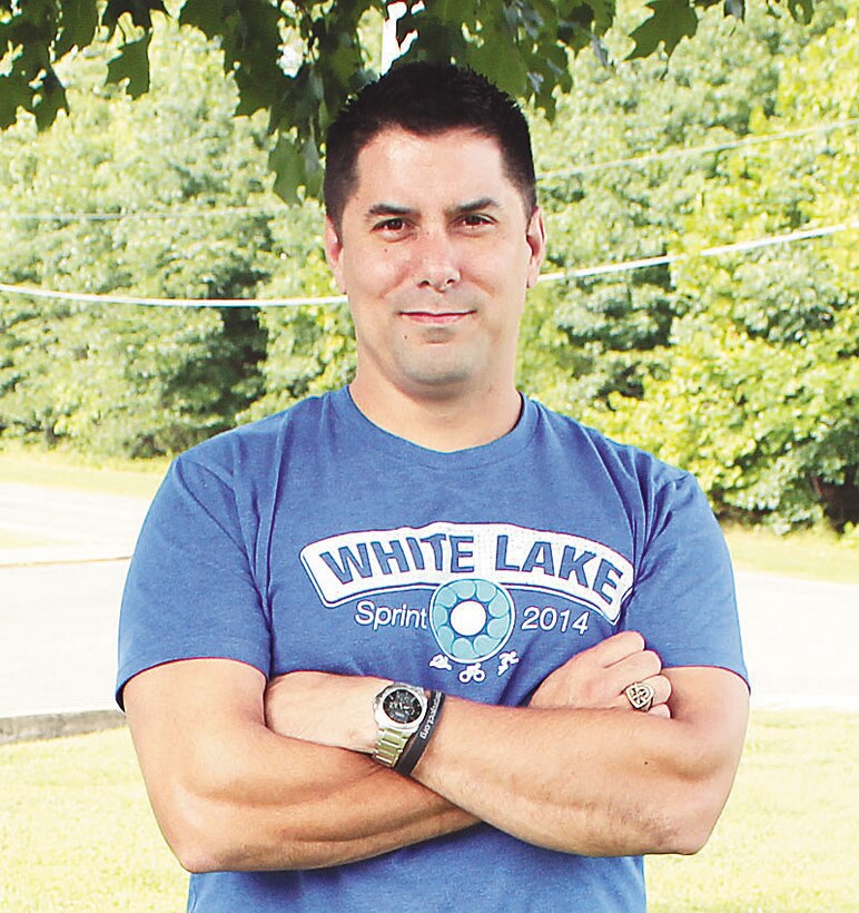 Army Master Sgt. Luis Morales, a single-leg amputee, will compete in the “Quantico Tri” on Sunday.